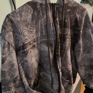 Grey fashion nova zip up hoodie with music symbols. Size medium